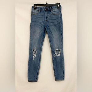 Carly Jean size 3 medium wash distressed skinny jeans.